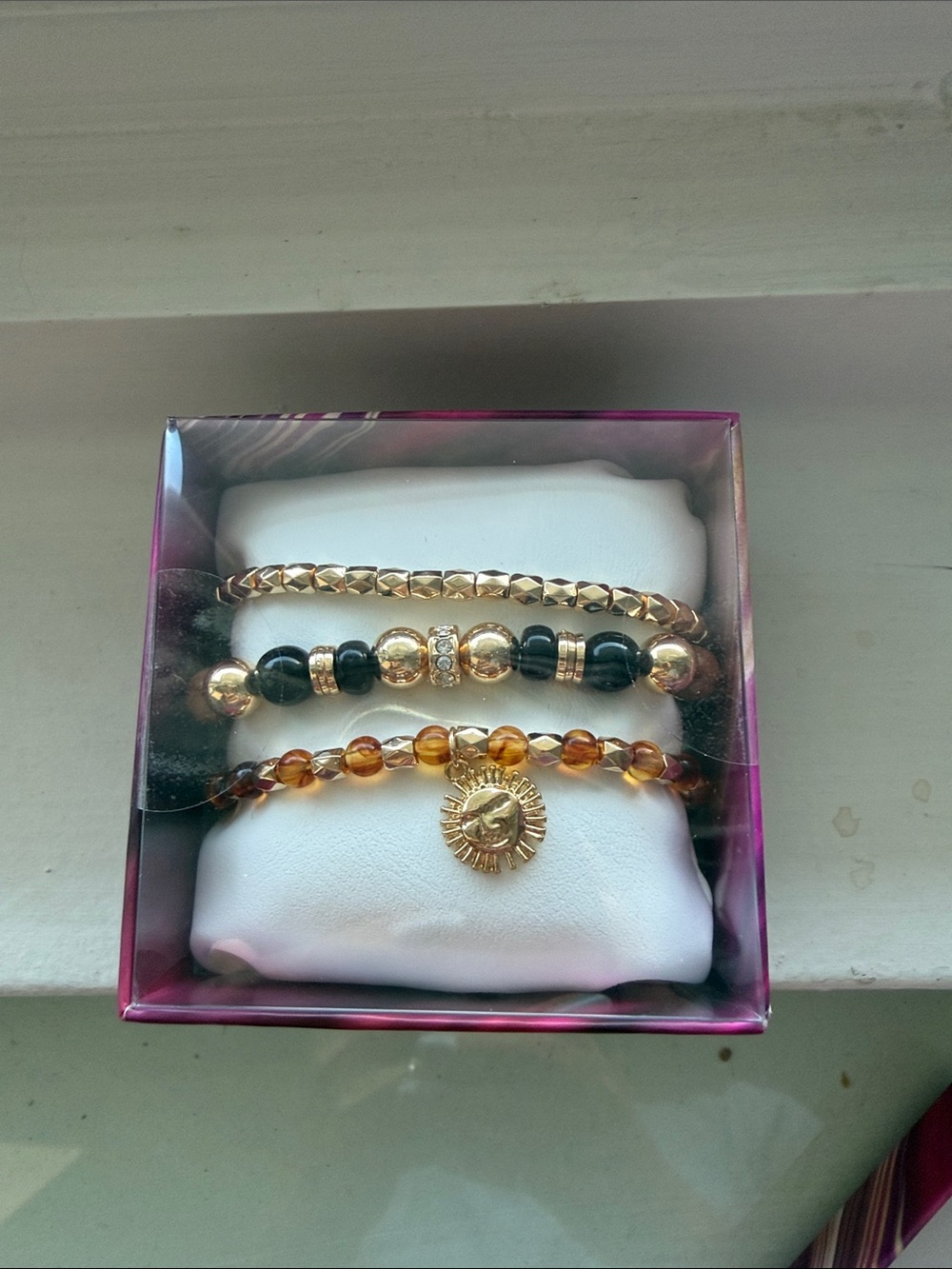 Gold Tone, Black and Amber Beaded Bracelet Set - Sun Charm